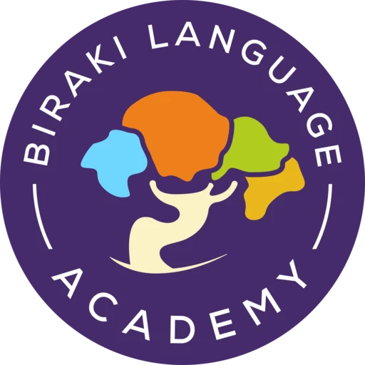 Λογότυπο Biraki Language Academy: δέντρο με πολύχρωμη κόμη σε μωβ δίσκο